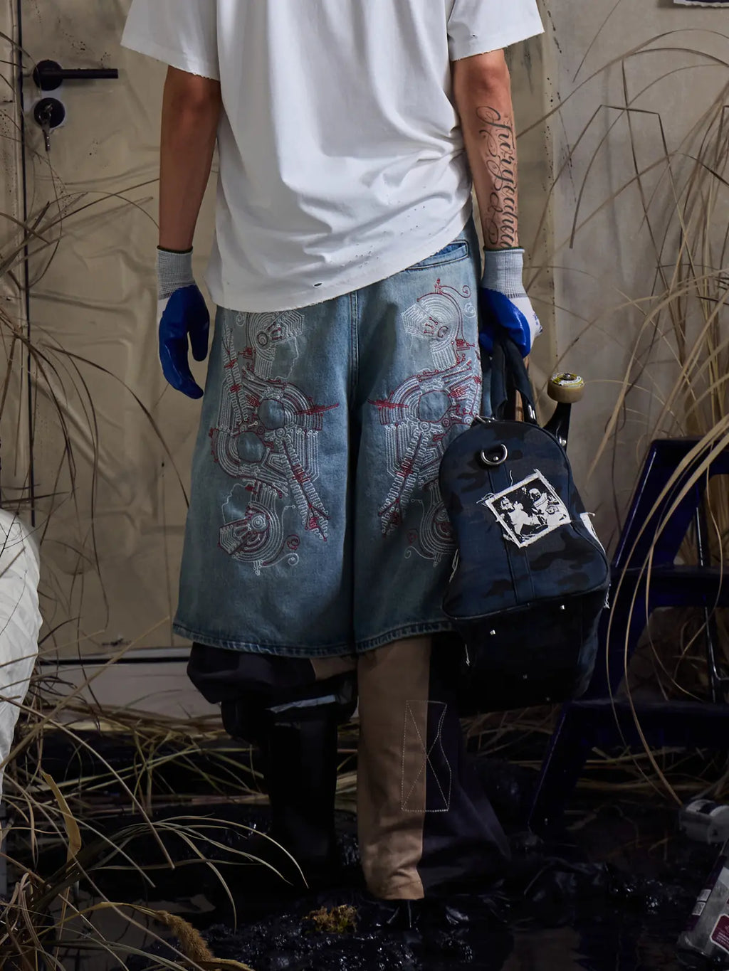 model wearing Wide Leg Denim Jorts back blue